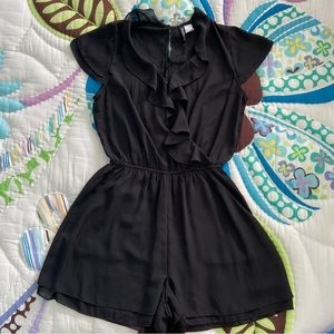 Chic Black Ruffled Romper size 6